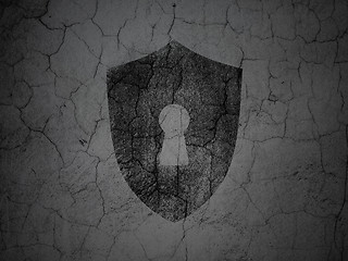 Image showing Safety concept: Shield With Keyhole on grunge wall background
