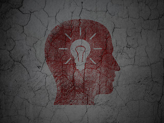 Image showing Marketing concept: Head With Light Bulb on grunge wall backgroun