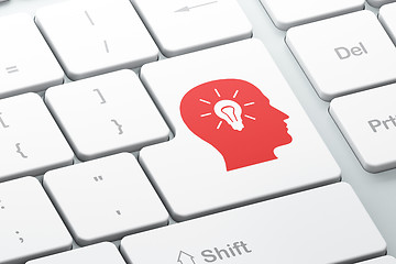 Image showing Advertising concept: Head With Light Bulb on computer keyboard b