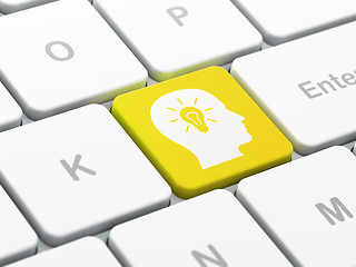 Image showing Marketing concept: Head With Light Bulb on computer keyboard bac