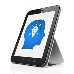Image showing Advertising concept: Head With Light Bulb on tablet pc computer