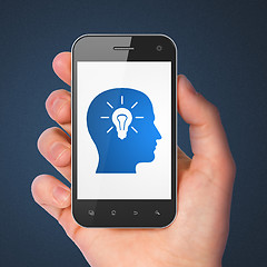 Image showing Education concept: Head With Light Bulb on smartphone