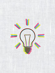 Image showing Finance concept: Light Bulb on fabric texture background