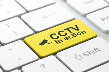 Image showing Protection concept: Cctv Camera and CCTV In action on computer k