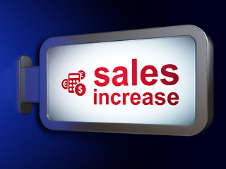 Image showing Marketing concept: Sales Increase and Calculator on billboard ba