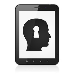 Image showing Protection concept: Head With Keyhole on tablet pc computer