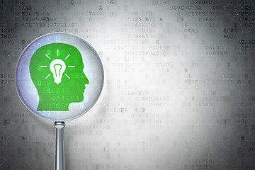 Image showing Finance concept:  Head With Light Bulb with optical glass on dig