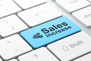 Image showing Advertising concept: Calculator and Sales Increase on computer k