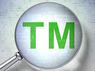 Image showing Law concept:  Trademark with optical glass on digital background