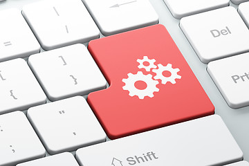 Image showing Web development concept: Gears on computer keyboard background