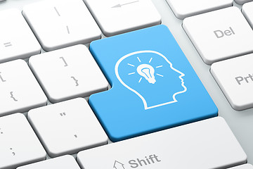 Image showing Information concept: Head With Lightbulb on computer keyboard ba