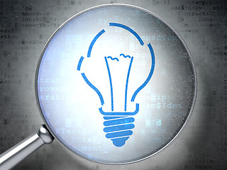 Image showing Business concept:  Light Bulb with optical glass on digital back