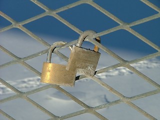 Image showing customary (Estonian) wedding tradition padlock on a guard-rail of a bridge. Symbolizes commitment