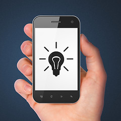 Image showing Business concept: Light Bulb on smartphone