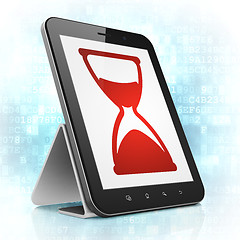 Image showing Timeline concept: Hourglass on tablet pc computer