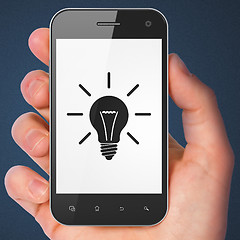 Image showing Business concept: Light Bulb on smartphone