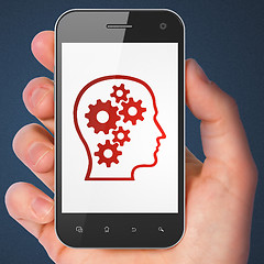 Image showing Data concept: Head With Gears on smartphone