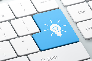 Image showing Finance concept: Light Bulb on computer keyboard background