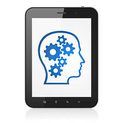 Image showing Information concept: Head With Gears on tablet pc computer