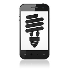 Image showing Finance concept: Energy Saving Lamp on smartphone