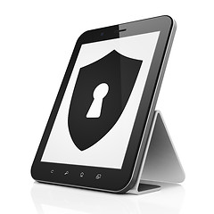 Image showing Security concept: Shield With Keyhole on tablet pc computer