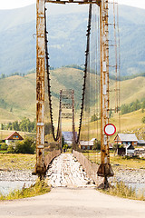 Image showing old suspension bridge above Katun