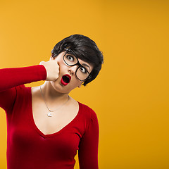 Image showing Girl punching himself