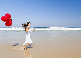 Image showing Running with ballons