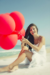 Image showing Girl with red ballons