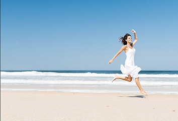 Image showing Jumping in the beach