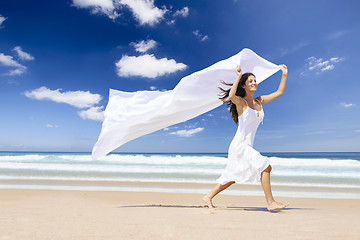 Image showing Jumping with a white scarf