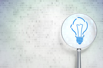 Image showing Finance concept:  Light Bulb with optical glass on digital backg