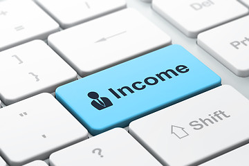 Image showing Business finance concept: Business Man and Income on computer ke