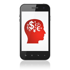 Image showing Education concept: Head With Finance Symbol on smartphone