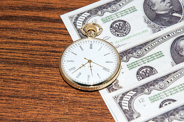 Image showing Pocket watches and money