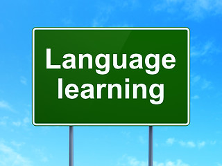 Image showing Education concept: Language Learning on road sign background