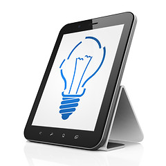 Image showing Finance concept: Light Bulb on tablet pc computer