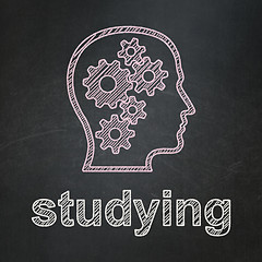 Image showing Education concept: Head With Gears and Studying on chalkboard background