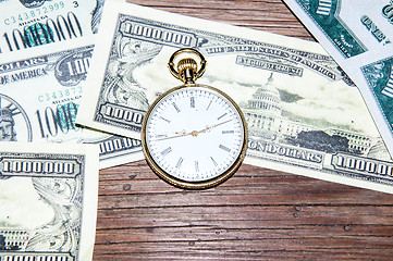 Image showing Pocket watches and money.