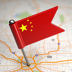 Image showing China Small Flag on a Map Background.