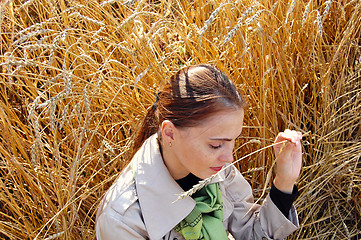 Image showing Woman and wheat ears