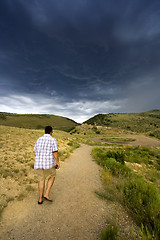 Image showing Walking into the Storm