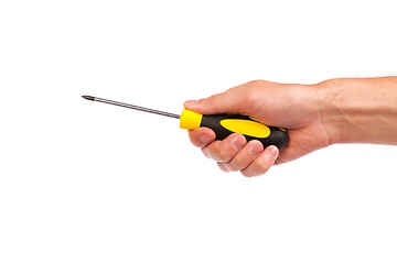 Image showing Hand holding a yellow and black screwdriver