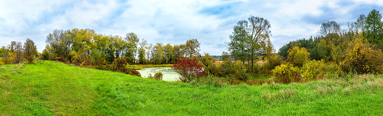 Image showing Forest lake in fall. Panorama