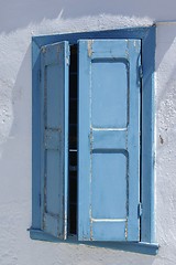 Image showing Weathered blue window