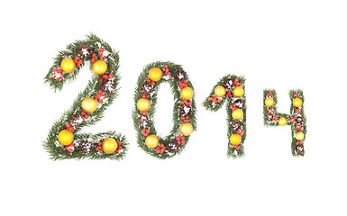 Image showing 2014 number written by christmas tree branches