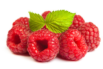 Image showing Bunch of a red raspberry on a white background. Close up macro s