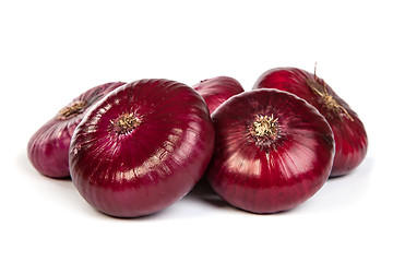 Image showing Group of a red onions, isolated on white