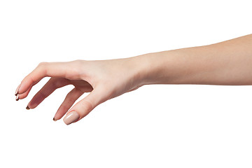 Image showing Female hand reaching for something on white