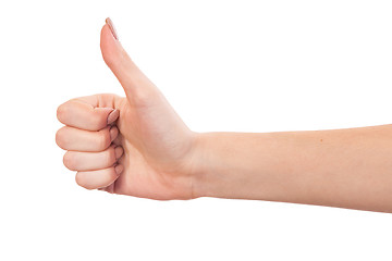 Image showing Female hand showing thumbs up sign isolated on white